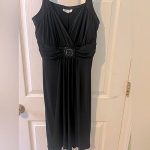Slimming Black Sleeveless Dress with beaded accent. Size 16